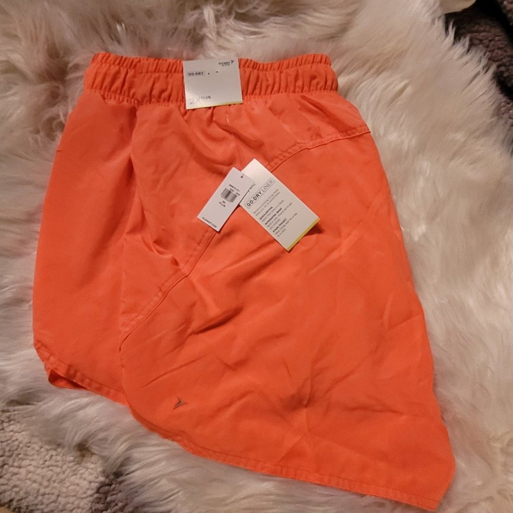 Mid-Rise StretchTech Dolphin-Hem Run Shorts for Women